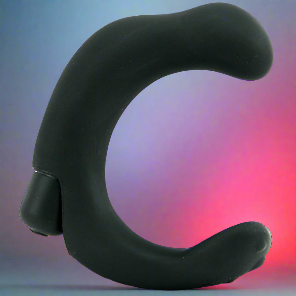 The P-Rock Prostate Massager by California Exotic Novelties is a sleek, C-shaped black vibrator on a gradient blue-pink background. Its waterproof design features a smooth surface with a small base or button, hinting at its powerful capabilities.