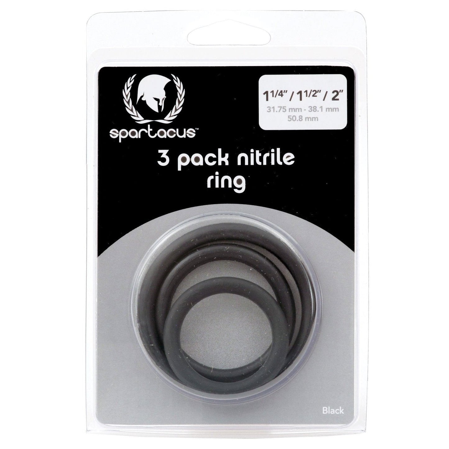 The Spartacus Cock Ring Set Pack of 3 packaging displays three skin-safe black rings in sizes 1-1/4, 1-1/2, and 2 with measurements in inches and millimeters, along with the prominent Spartacus logo.