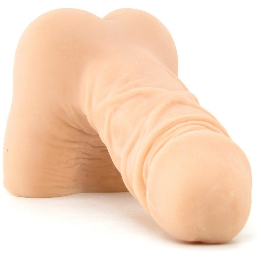 A close-up of the skin-colored Pipedream Extreme Fuck My Cock from Pipedream, designed to resemble a human penis. This TPE sex toy showcases detailed texture and shape against a plain white background.