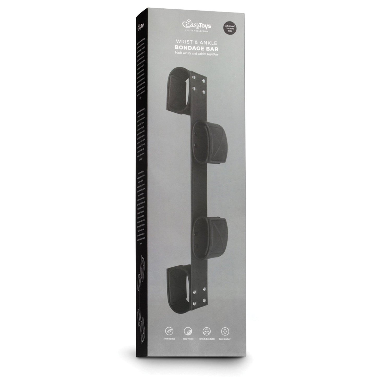 The Easy Toys Wrist & Ankle Bondage Bar comes in a sleek black box, showcasing its faux leather cuffs for restraint. The elegant packaging includes images and white text, adding sophistication to your BDSM collection.