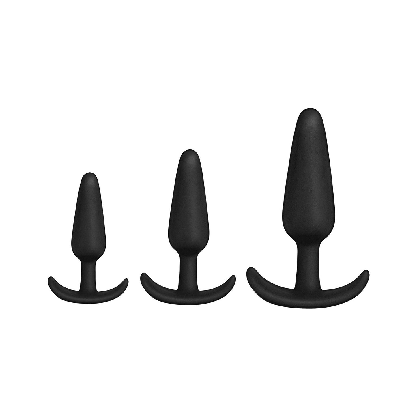 Doc Johnsons Mood Naughty 1 Anal Trainer Set includes three black silicone butt plugs in ascending size. They feature a smooth, tapered shape and flared base for safe use, displayed on a plain white background to highlight their sleek design.