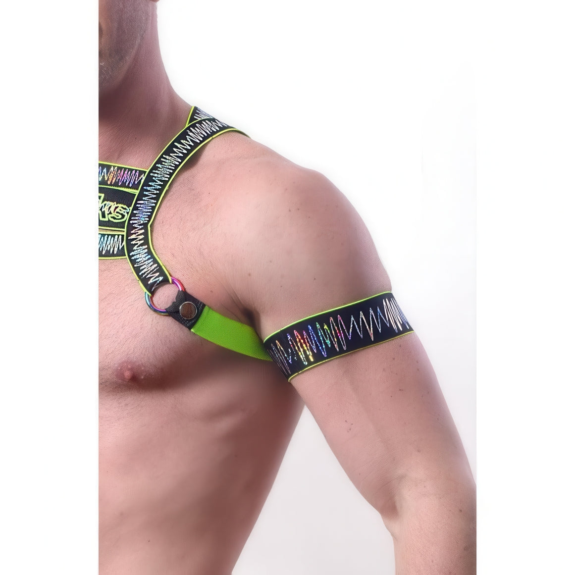 A shirtless model wears *ssTricks Electro Arm Bands in Neon Green, featuring colorful zigzag stitching, shown from neck to upper torso on a white background for a vibrant glow-up look.