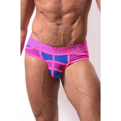 A muscular man models *ssTricks CyberTech Briefs in Neon Pink & Blue, featuring a wide, glowing waistband with the brand’s name. Only his torso and upper thighs are shown against a plain background, emphasizing the briefs’ futuristic style.