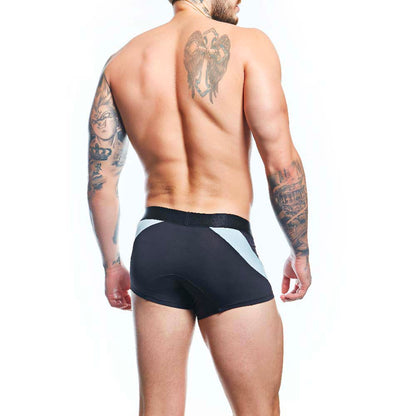 A shirtless man, displaying tattoos, wears Agacio Boxer Trunks Comfortable Underwear with contour pouch magic. Facing away against a plain white background, he adds intrigue to his style.