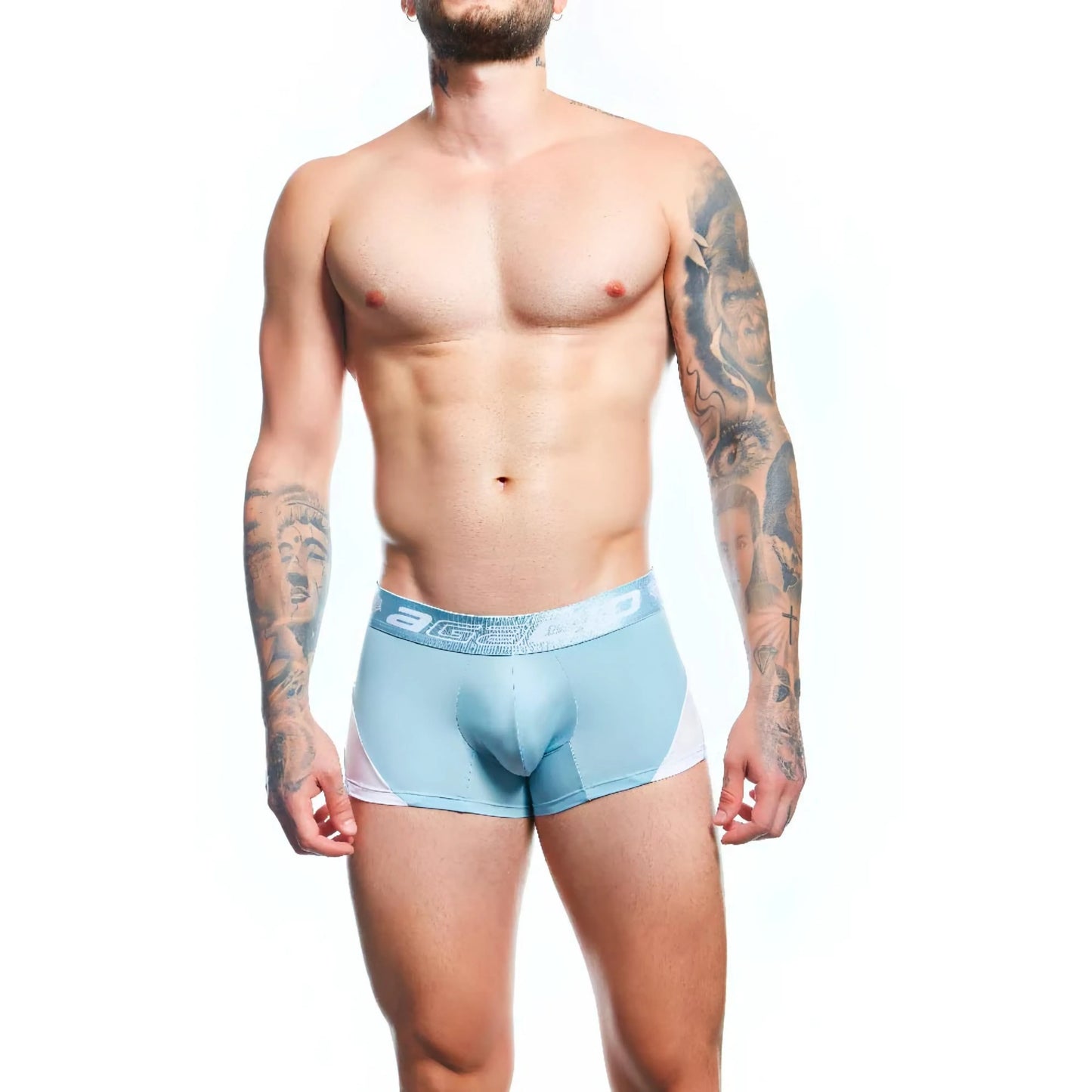 A shirtless person faces forward in Agacio Boxer Trunks Comfortable Underwear, boasting a contour pouch magic design. The light blue trunks with white accents showcase the premium fabric blend. Their tattooed arms stand out against a plain white background.
