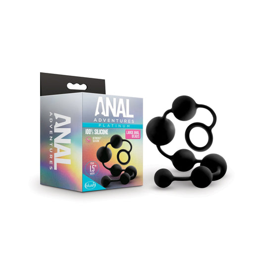The Blush Anal Adventures Platinum Silicone Anal Beads by Blush Novelties feature an extra-long design showcased on the front of a box with colorful accents and product information. They are black Ultrasilk silicone, known for being body-safe, and are arranged beside the box.