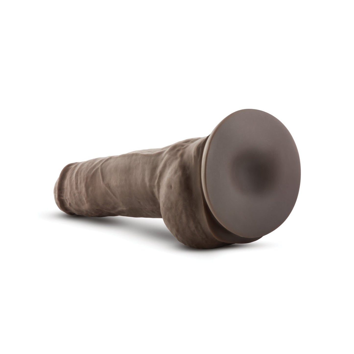 The Blush Au Naturel 10 Big Boy Realistic Dildo by Blush Novelties is displayed on a white background, featuring a brown silicone build with Dual Density for lifelike texture and a flat suction cup base.