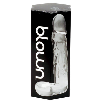 A black hexagonal box with Adams Toy Box Blown Realistic Glass in white. It features a transparent, handcrafted borosilicate glass object shaped like a phallic symbol for realistic artistry.