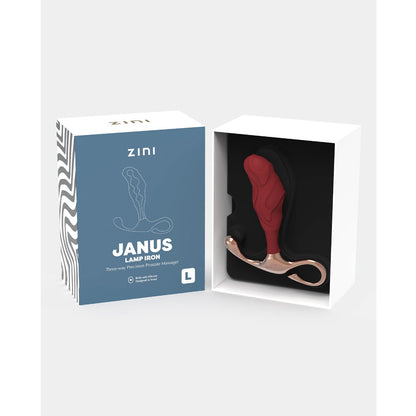 The Zini Janus Lamp Iron, a red and gold prostate massager made of body-safe silicone, is shown alongside its branded box featuring product imagery. Its ergonomically designed for optimal stimulation.