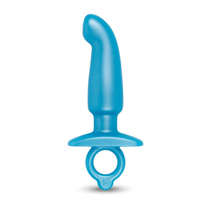 The b-vibe Butties Hither Tapered Prostate Plug from b-vibe is a blue silicone anal plug. It features a curved tip and ring handle for ease of use, making it ideal for P-spot stimulation with its smooth surface and ergonomic shape, similar to a Silicone Prostate Plug.