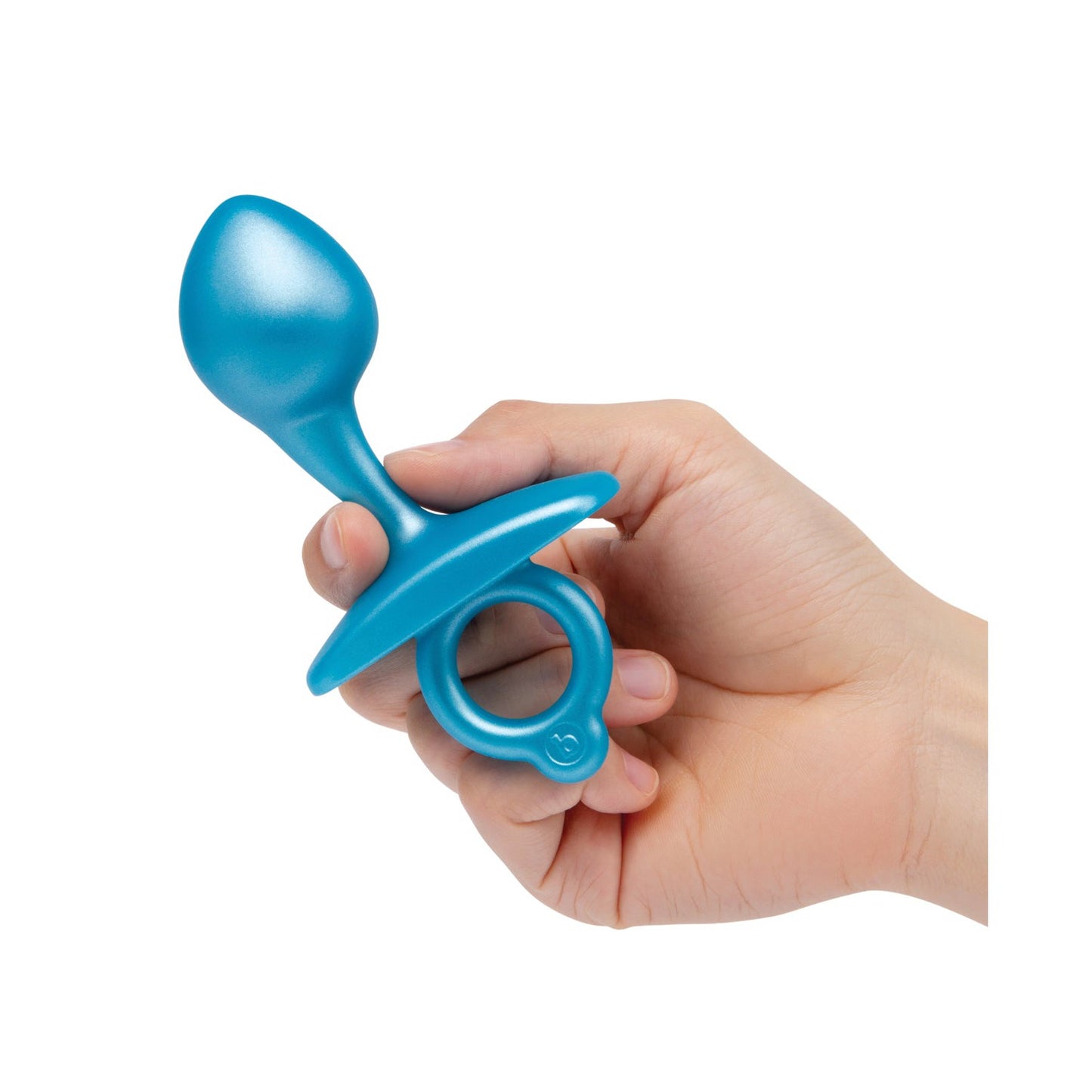 A hand holding a b-Vibe Butties Bulb Tapered Prostate Plug, featuring a blue teardrop shape and circular grip base, by the brand b-vibe.