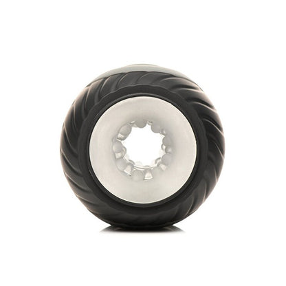 A black Curve Novelties Jock 10x Vibrating Double Masturbator, featuring a white core and grooved design for smooth traction, is shown from the side against a white background.