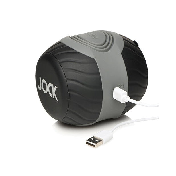 The Curve Toys Jock 10x Vibrating Double Masturbator by Curve Novelties features a textured black and gray design with USB charging, supports 7 vibration modes, and proudly displays JOCK on one side.