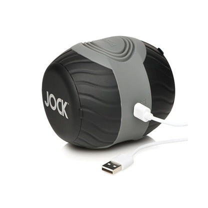 The Curve Toys Jock 10x Vibrating Double Masturbator by Curve Novelties features a textured black and gray design with USB charging, supports 7 vibration modes, and proudly displays JOCK on one side.