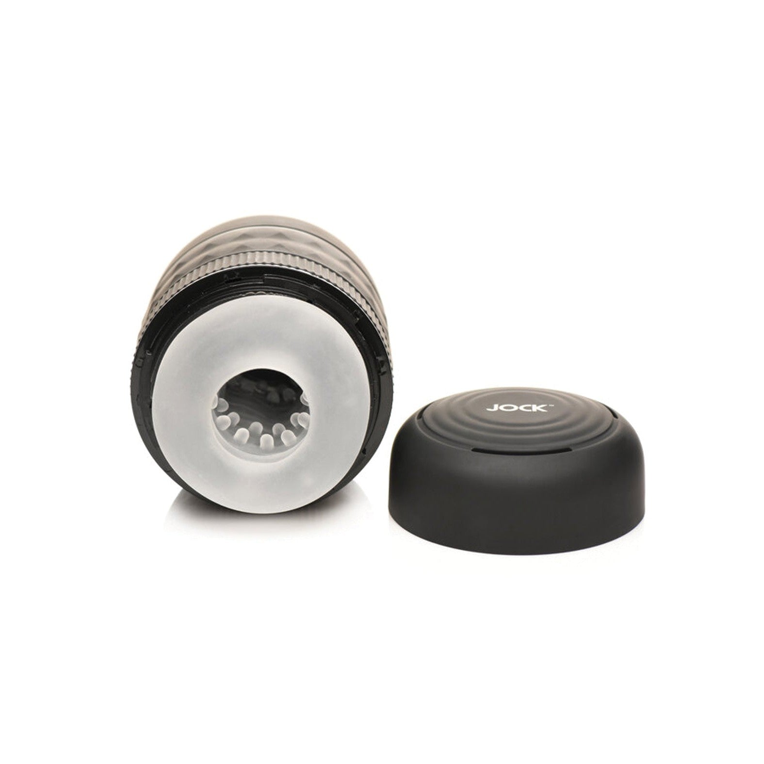 A black cylindrical object with a textured interior, like a Curve Toys Jock fitness device, sits on a white surface. Its detachable cap labeled Jock is beside it. The Curve Novelties Jock Squeezable Tunnel Double Masturbator provides adjustable tightness for personalized comfort.