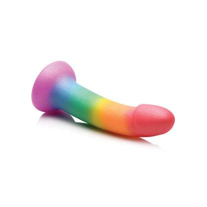 The Curve Novelties Simply Sweet 6.5 Phallic Rainbow Dildo showcases vibrant colors from red to purple, featuring a pink base and smooth, glossy finish for visual and tactile delight.