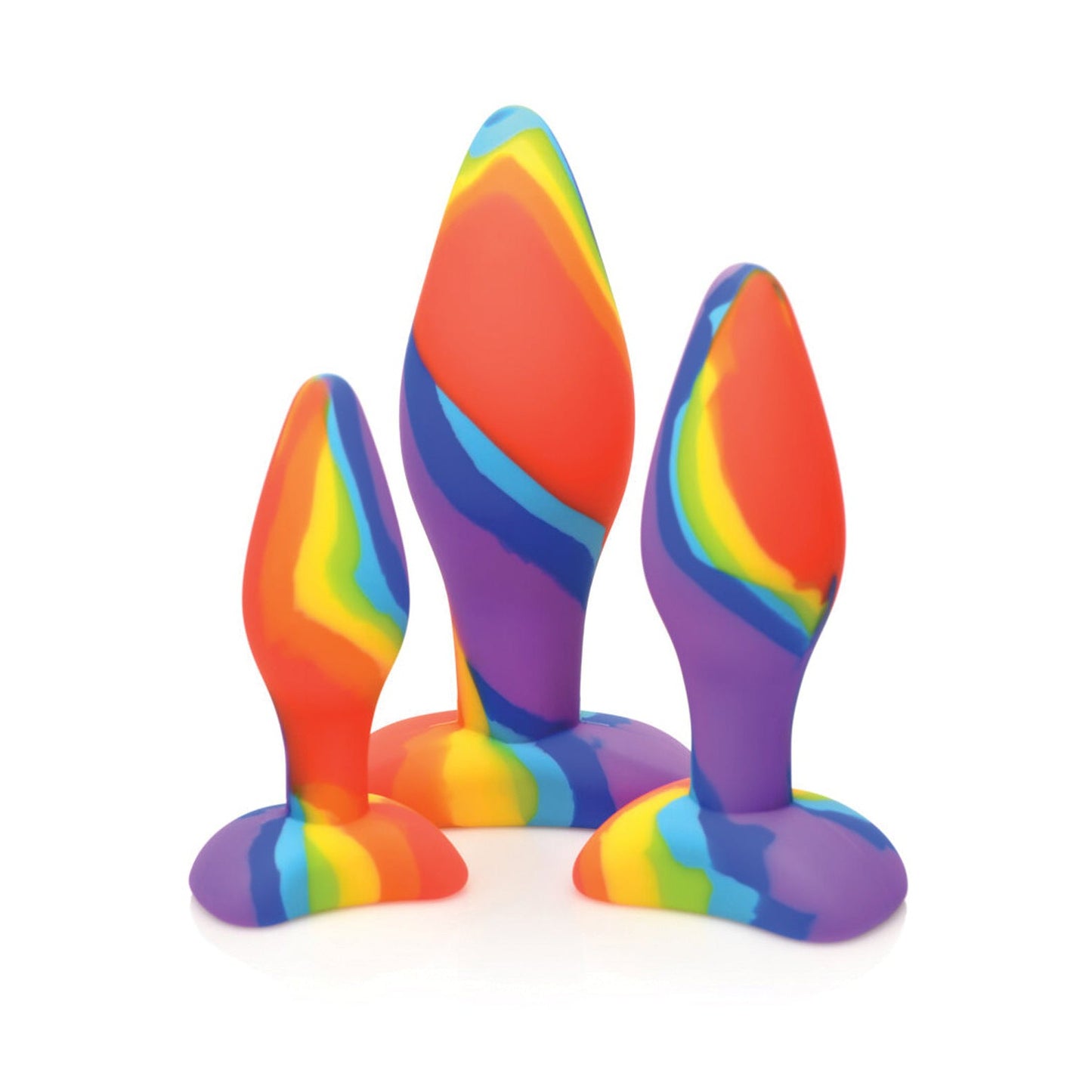 Explore the Curve Novelties Curve Toys Simply Sweet Rainbow Silicone Butt Plug Set. Crafted from body-safe silicone, these three smooth, tapered plugs in red, orange, yellow, green, blue, and purple offer perfect anal training with varying sizes and a stable wide base.