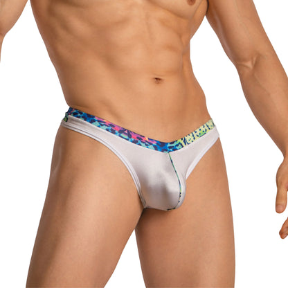 A man wearing the Daniel Alexander Thongs for Men with Leopard Print exudes confidence, featuring a sleek design and second-skin comfort. The photo highlights his torso and upper legs against a plain white backdrop.