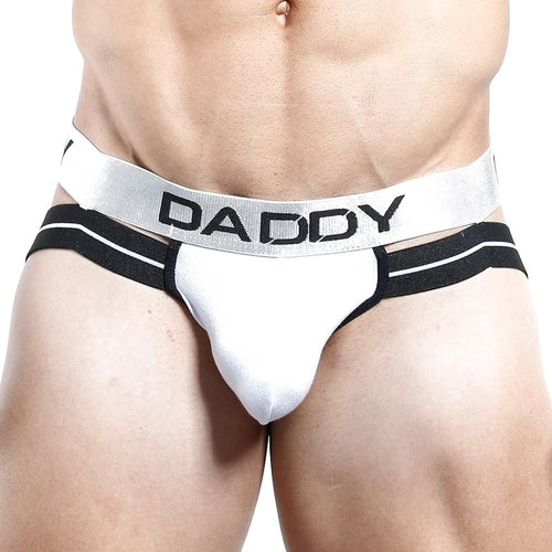 A close-up of someone wearing the Daddy Jockstrap – Wear the Title, Own the Throne by Daddy, showing its wide waistband and bold DADDY lettering.