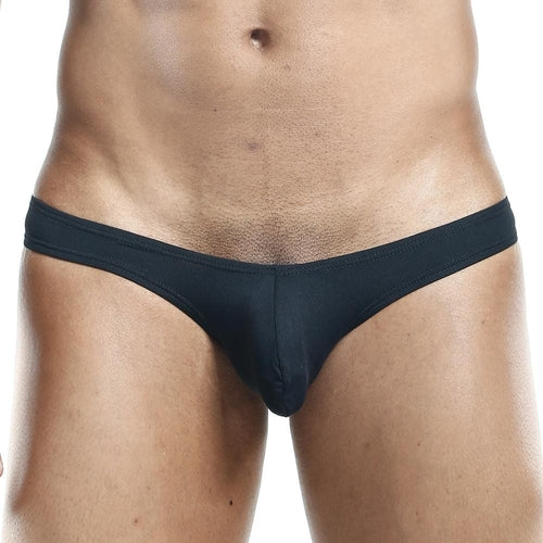 A model is shown waist-to-thigh wearing the sleek black Daddy Slip Bikini by Daddy against a plain white background, showcasing the allure of sexy underwear.