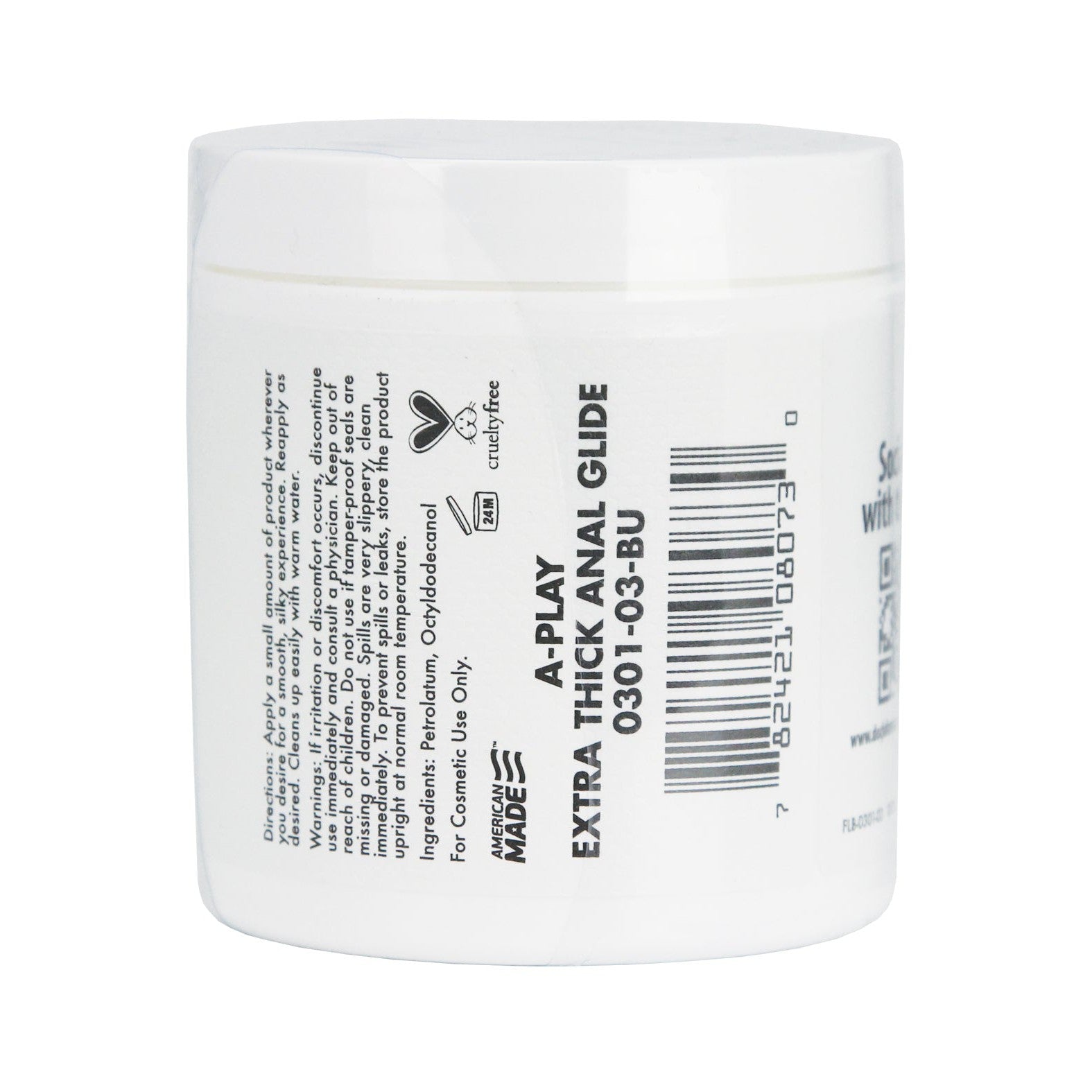 A white jar labeled A Play Extra Thick Anal Glide Cushioning Oil Based Formula features a thick, long-lasting oil-based formula and is adorned with various informational texts and a barcode.