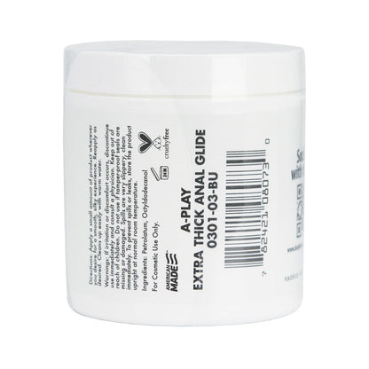 A white jar labeled A Play Extra Thick Anal Glide Cushioning Oil Based Formula features a thick, long-lasting oil-based formula and is adorned with various informational texts and a barcode.