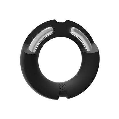 This circular black Merci Hybrid Silicone Covered Metal Cock Ring by Doc Johnson features two metallic inner sections and a sleek modern design with a small emblem. Its performance-boosting qualities are accentuated against the white background, highlighting its innovative nature.