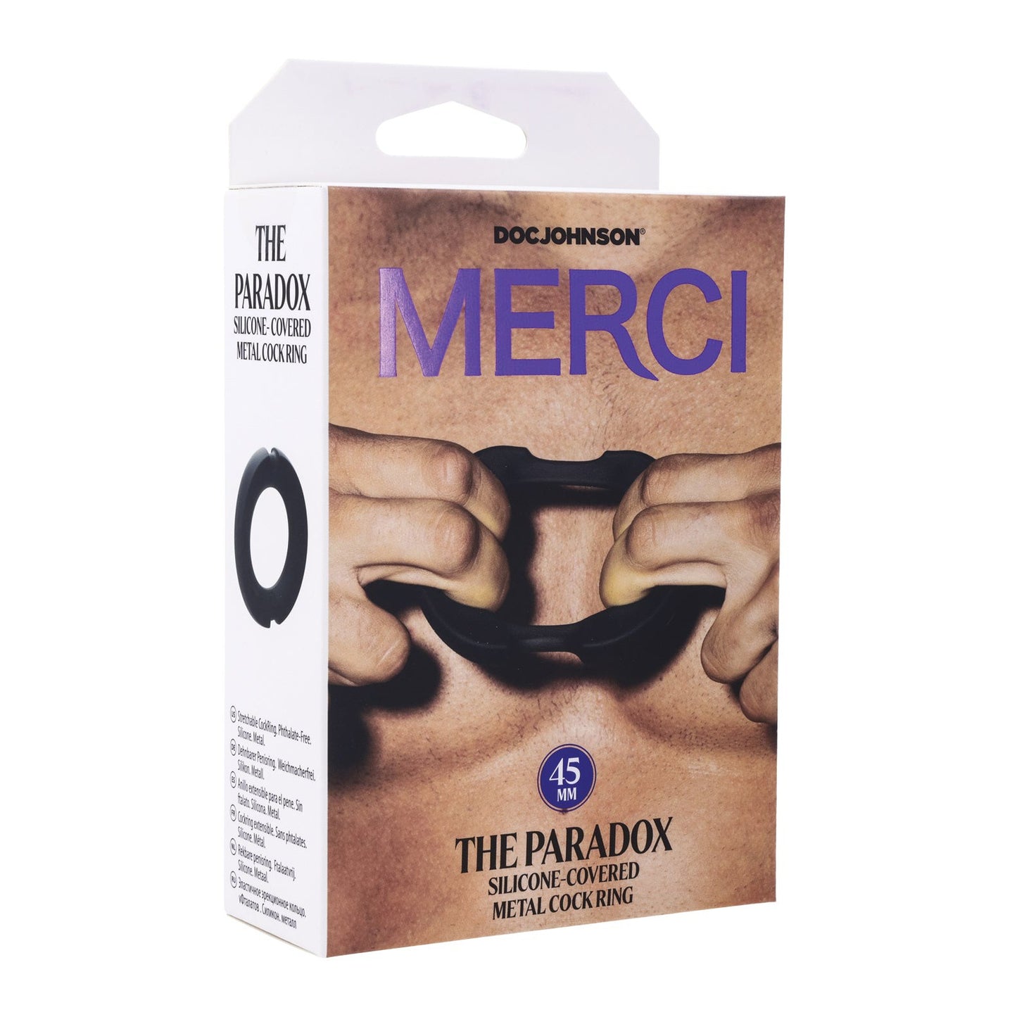 Box of Merci Hybrid Silicone Covered Metal Cock Ring by Doc Johnson. Feel intense sensation with this metal-silicone ring. Packaging highlights hands displaying the ultimate performance enhancer.