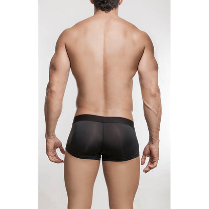 A muscular man stands with his back to the camera wearing Edipous Eros Short Boxer from Edipous, showcasing both style and comfort. The plain white background highlights the sporty design and supportive fit of his black fitted underwear.