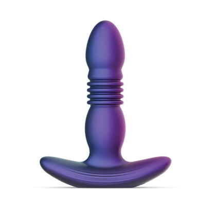 The Hueman Supernova Thrusting Butt Plug, a purple silicone adult toy, features a tapered design with ribbed texture near the base and an ergonomic curved handle. It offers multiple vibration patterns, is waterproof, and stands elegantly against a plain white background.