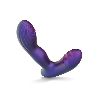 The Hueman Galaxy Tapping Butt Plug is a purple silicone anal toy with an ergonomic design, featuring a textured exterior and curved form. It stands upright against a white backdrop.