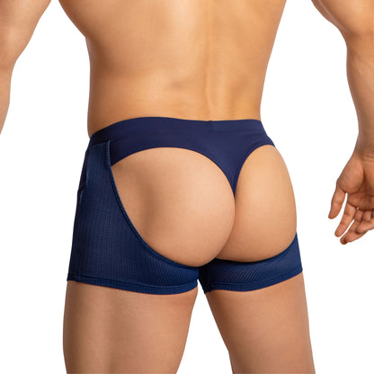 A person wears Edipous Boxer Briefs with navy blue chaps-style and cut-out sides and back, revealing the behind. The breathable mesh design emphasizes the lower back and legs against a plain white background.