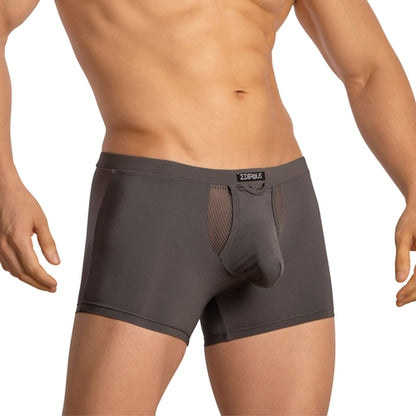 Someone is wearing the Edipous Boxer with Pouch in dark gray featuring front mesh details. The contoured pouch enhances comfort and fit, with a plain white background showcasing the premium stretch and design of this Edipous underwear.