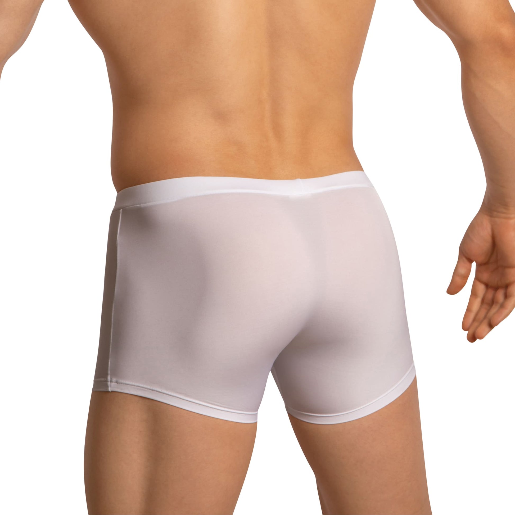 A person in white Edipous Boxer with Pouch, featuring Premium Stretch fabric and a contoured pouch for comfort, viewed from the back.