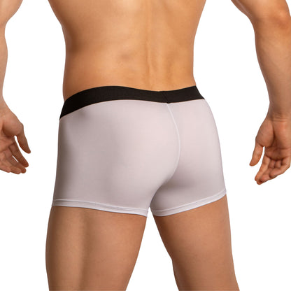 An individual embodies modern swagger wearing Edipous Mens Boxer Trunks in white with a black waistband. The back view highlights the lower back and upper legs against a plain white background, emphasizing this classic Edipous style.