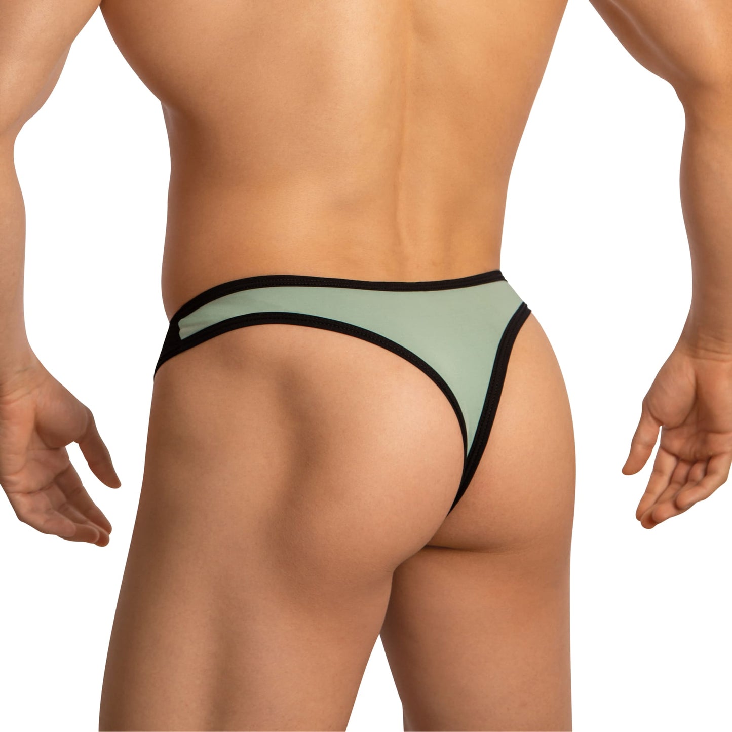 A person wears an Edipous Mens Thong with an asymmetrical cut in green and black. The minimalist yet stylish design stands out against a plain white background.