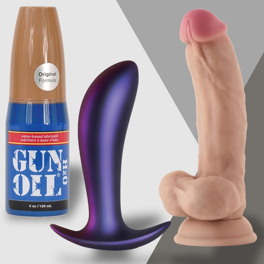 A bottle of Gun Oil water-based lubricant sits next to a purple, curvy object and a realistic beige item with a suction cup base, all branded as Weekend Shenanigans by Adams Toy Box, against a two-tone backdrop for a fun-filled weekend.
