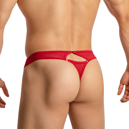 The image showcases a person from behind wearing Good Devil Sexy Sheer Thongs, featuring cut-out sections and crafted from a luxurious fabric blend. Their back and upper arms are visible, enhancing the allure.
