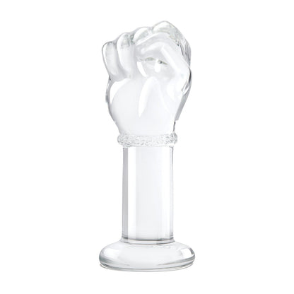 The Gläs 5” Fist Butt Plug is a detailed, transparent clear glass sculpture shaped like a raised fist on a cylindrical base. This unique art form suits those interested in temperature play and striking designs.