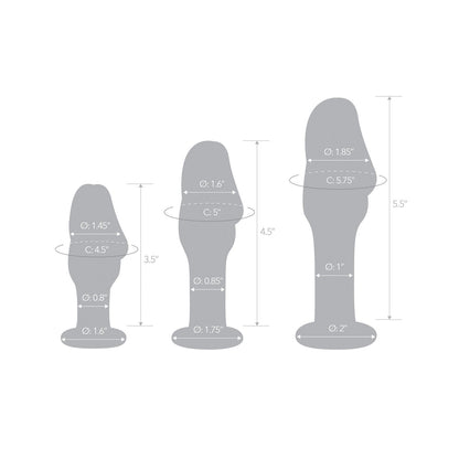 The Glas Helmet Head Anal Training Kit by Gläs features three gray silhouette plugs, helmet-shaped, with heights of 3.5, 4.5, and 5.5. Circumferences range from 0.8 to 2 at various points, perfect for temperature play experimentation.