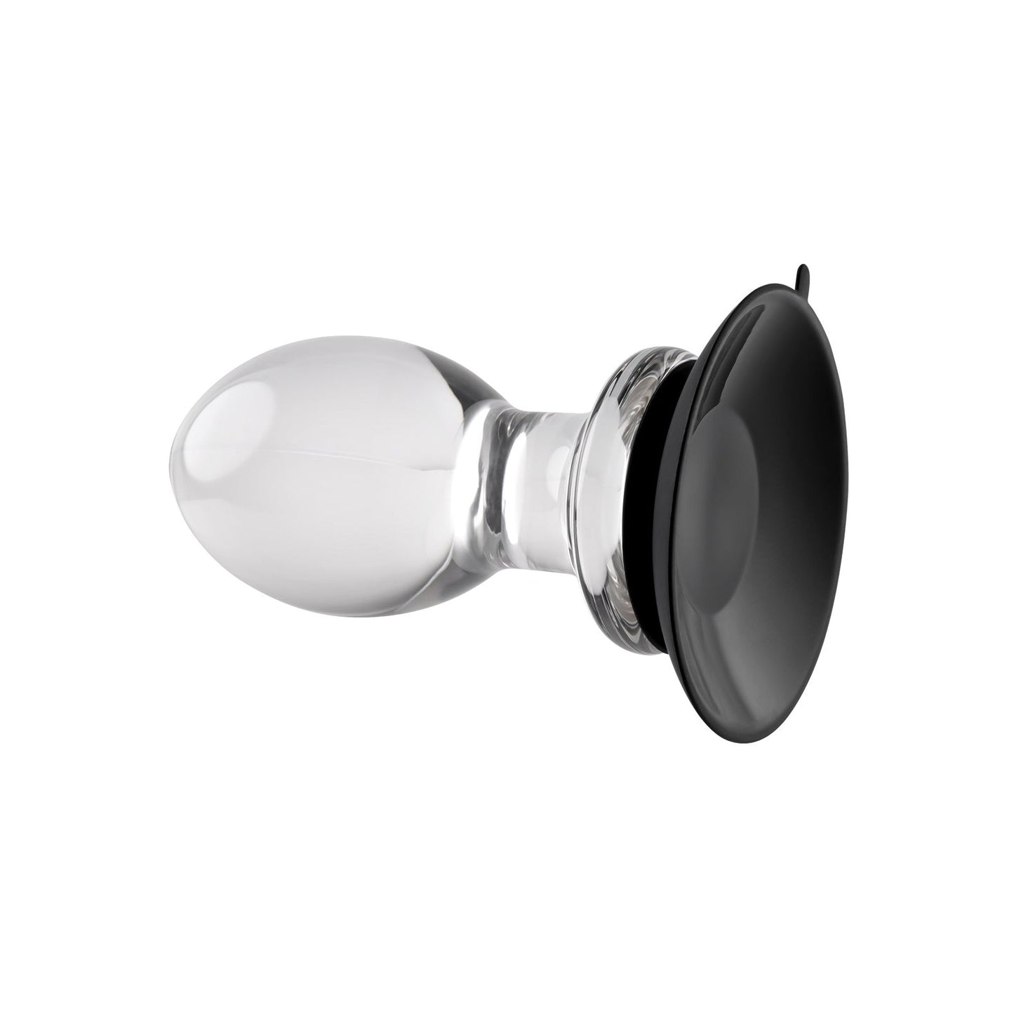 The Gender X Crystal Ball Plug With Suction Cup is an oval, transparent glass object featuring a wide silicone suction cup at one end, ideal for attachment or display. Its smooth and reflective surface resembles a crystal ball.