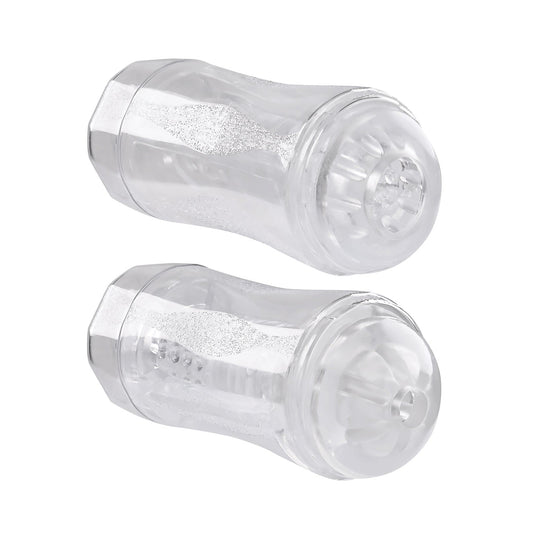 Two Gender X Double Fantasy textured cylindrical objects, transparent with intricate internal patterns, positioned side by side on a white background.