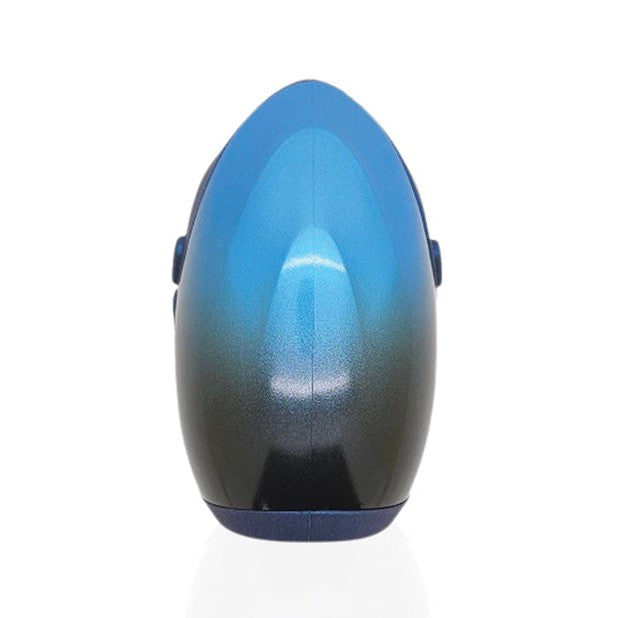 A shiny blue and black egg-shaped Hot Octopuss Pulse Dragon Eye 10th Anniversary Limited Edition stands upright on a reflective white surface, exuding an air of hands-free magic.