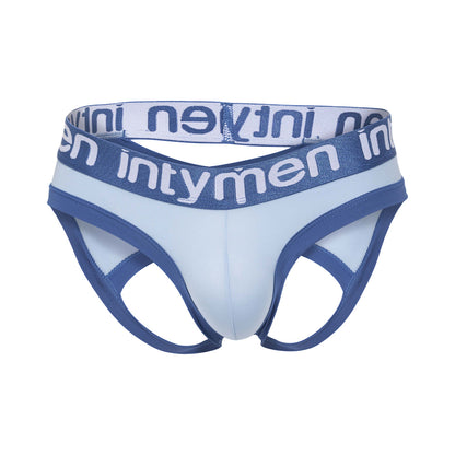 The Intymen Desert Jockstrap Crotchless Underwear, featuring light blue with dark blue trim and cut-out sides, ensures a supportive fit. It has a white waistband with intymen printed in blue, offering ultimate comfort from premium materials.