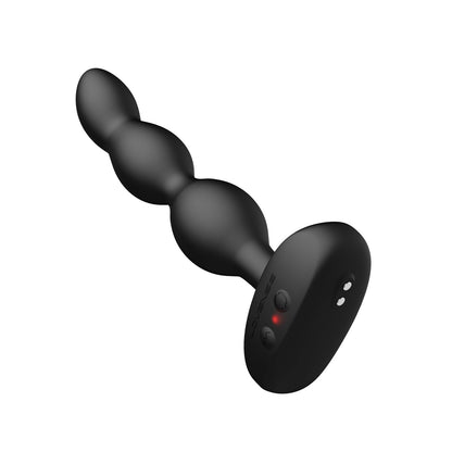 The Lovense Ridge Bumpy Anal Plug, a black silicone device with a smooth, graduated design and three rounded sections, is ideal for anal use. It features two buttons at the base, a small charging port, and app compatibility for seamless control. Pictured on a white background.