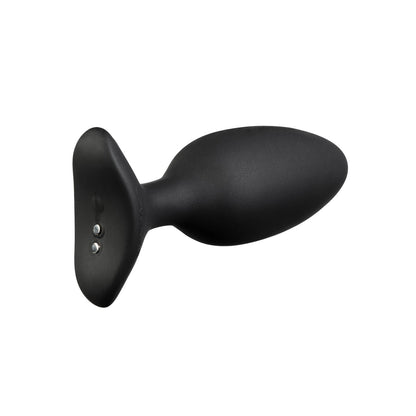 The Lovense Hush 2 Butt Plug, a black 100% silicone device with a tapered shape and flared base, sits against a white background, subtly serving as your silent partner.