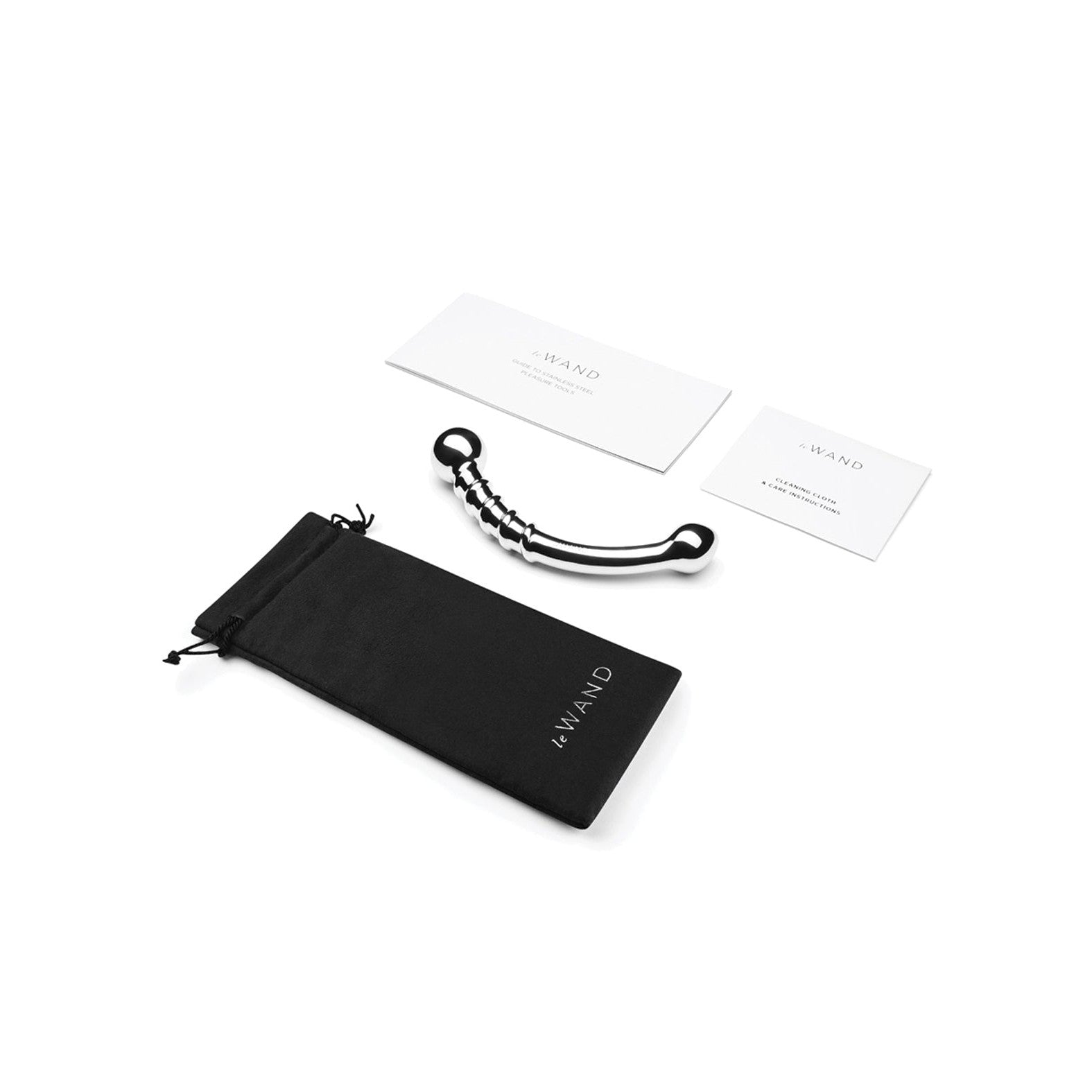 A sleek Le Wand Stainless Steel Bow sits beside a black drawstring pouch and two labeled white cards on a pristine white background, perfect for temperature play.