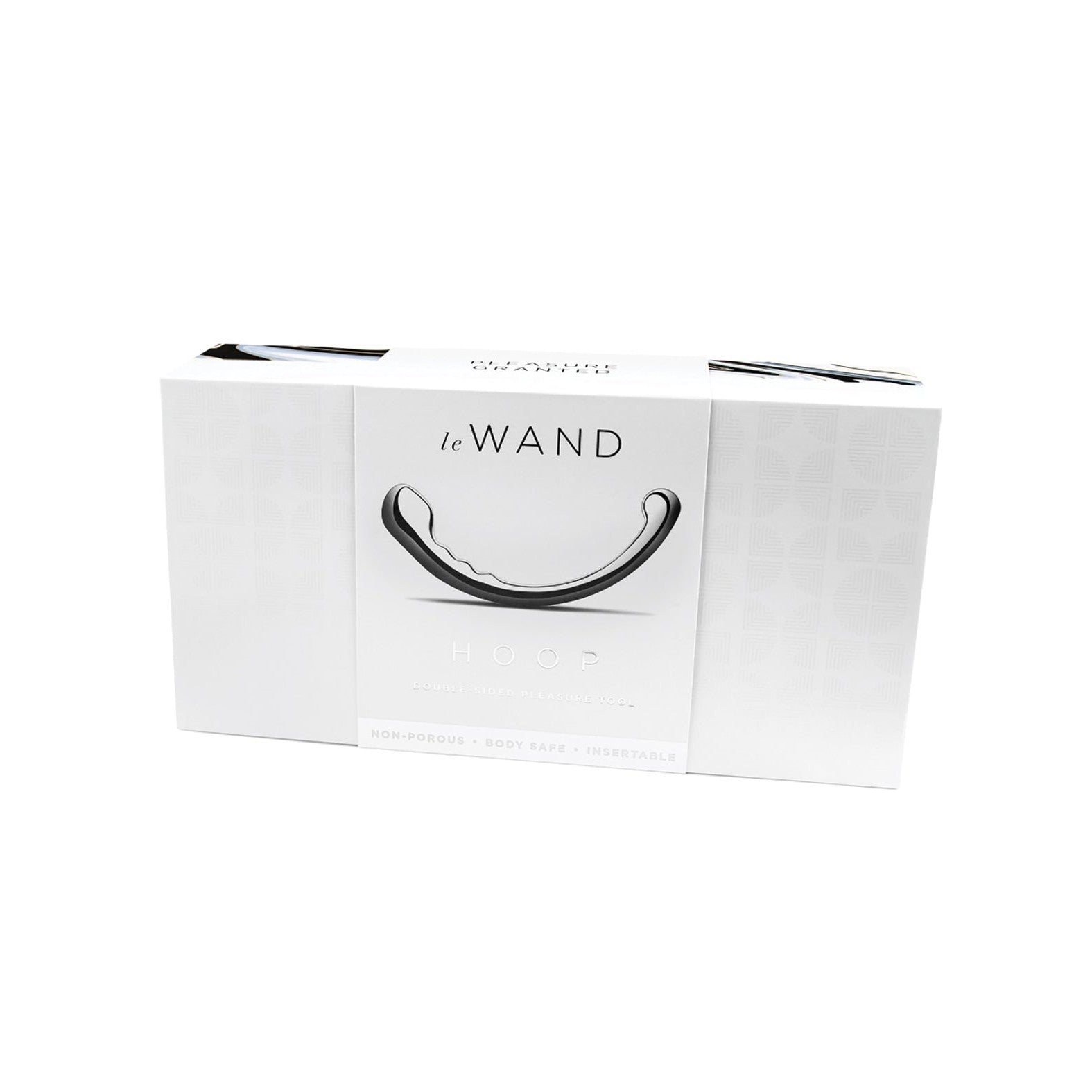 A white box featuring Le Wands Stainless Steel Swerve displays an image of its sleek, curved design. Packaging highlights features like non-porous material, body-safe assurance, and unbreakable quality—ideal for those desiring a stainless steel sensation.