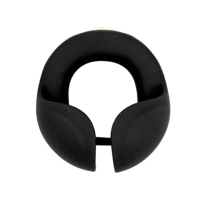 The Nasstoys Cockpower Scrotum Hugger Cock Ring is a black, horseshoe-shaped silicone accessory with an opening at the bottom, resembling a padded clamp. It features a smooth matte finish and provides snug comfort.