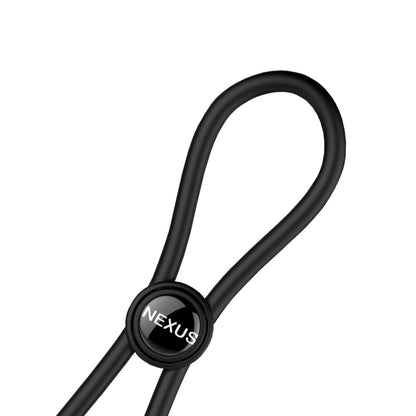 The Nexus Forge Single Lasso by Nexus is a black cable loop with a circular NEXUS connector. Set against a white background, it elegantly loops at the top for a sleek and customized fit.